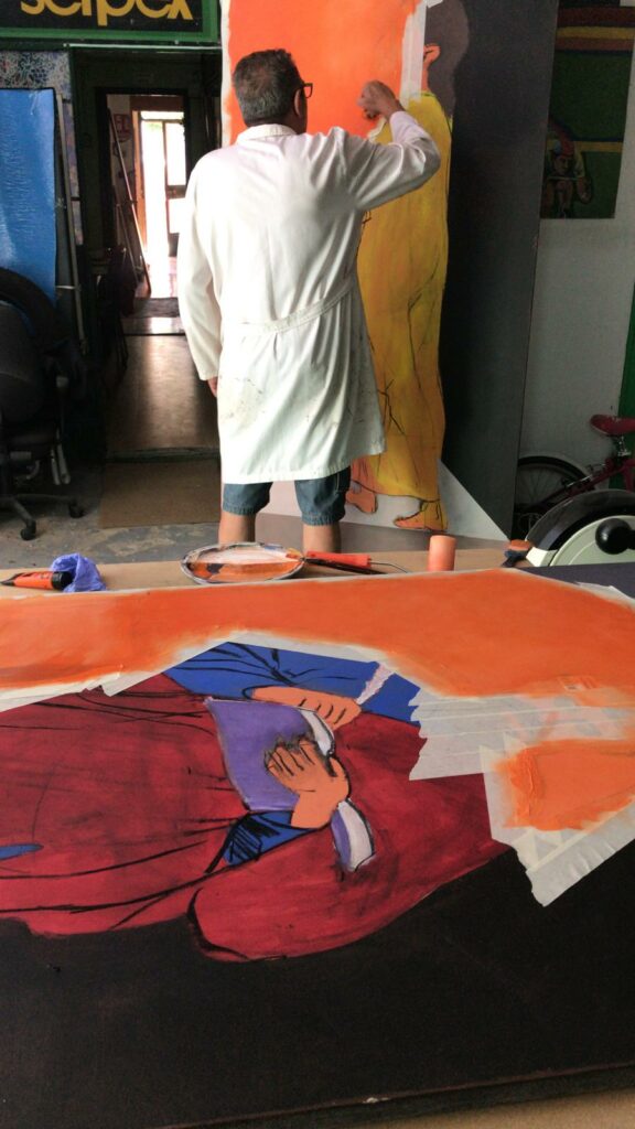 Enrique pintando su obra